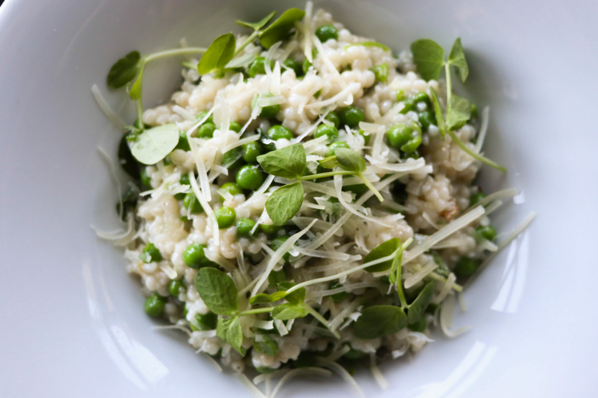 Spring pea and basil pasta in bowl