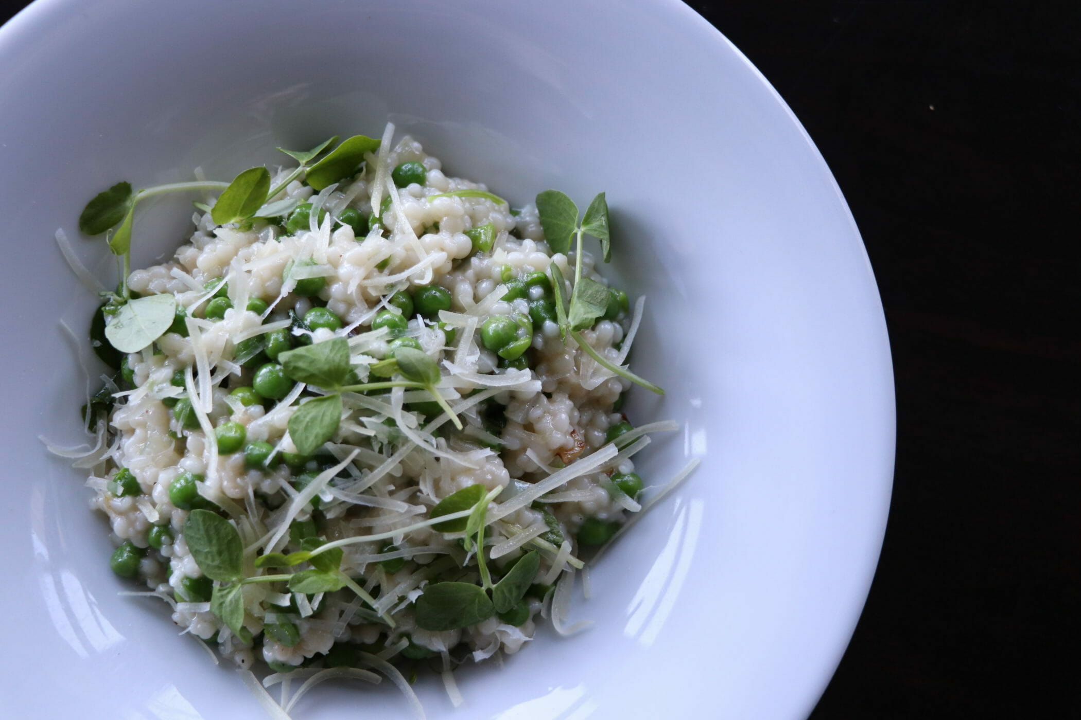 Spring pea and basil pasta in bowl
